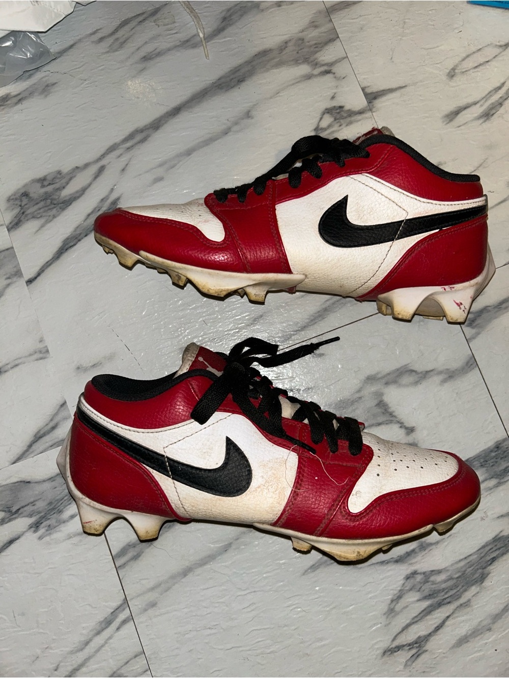 Jordan 1 low cleats.